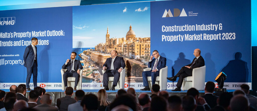 Kenneth Farrugia (CEO, Bank of Valletta plc), George Debono (CCO, BNF Bank plc), Michael Bonello (CEO, Alliance Group), Matthew Zerafa (CEO, Malta Housing Authority)