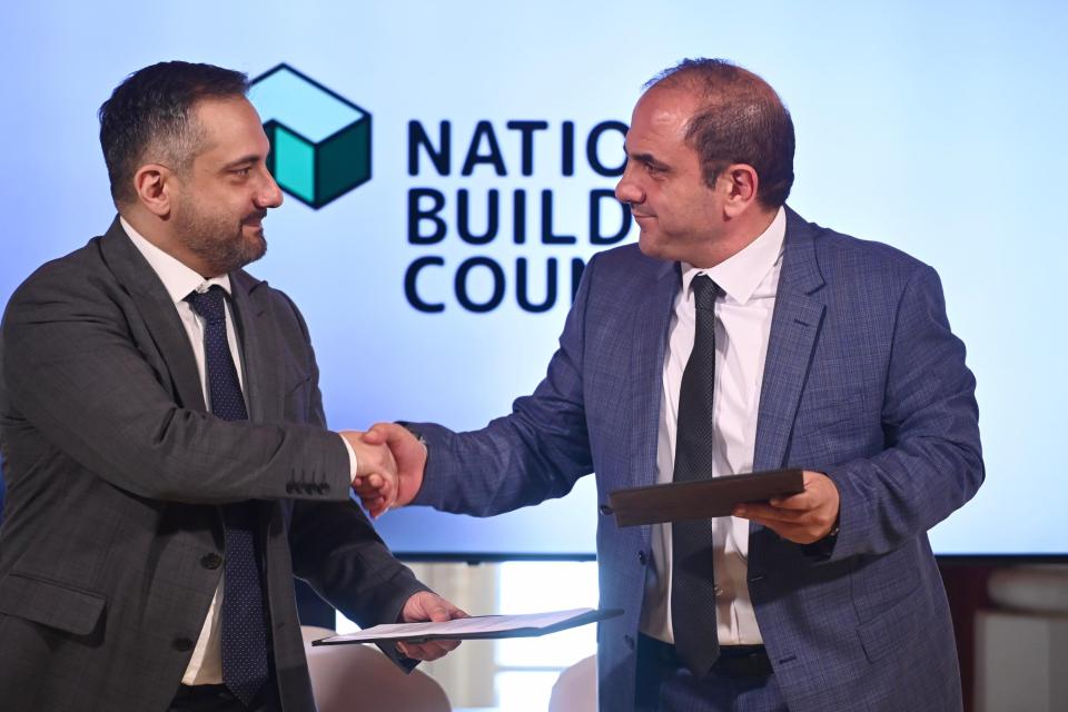 Kamra tal-Periti (KTP) president Andre Pizzuto and the Malta Developers Association (MDA) president Michael Stivala signed into force the “National Building Council” on Friday. Photo: timsofmalta.com / Jonathan Borg